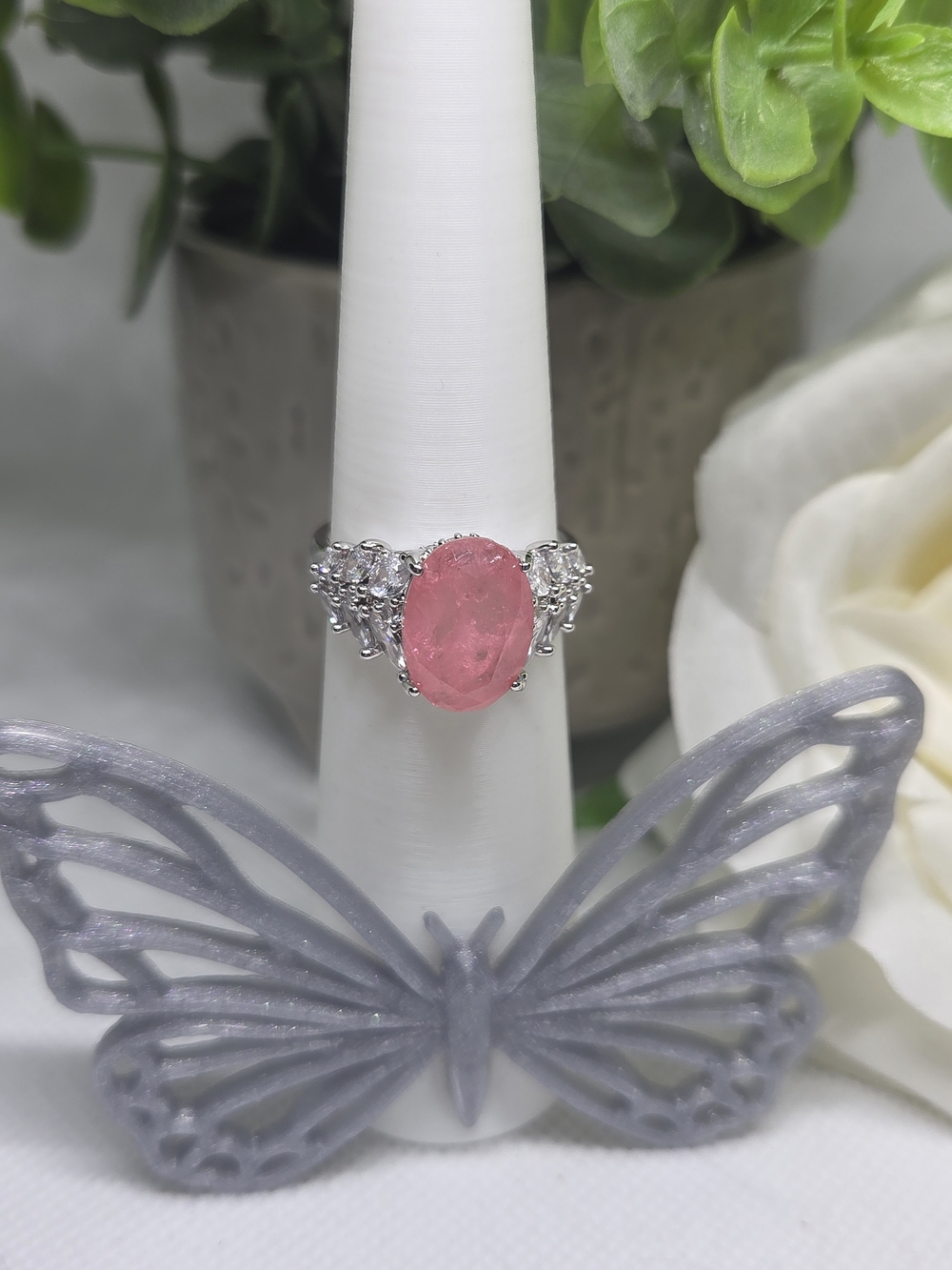 BP Pink Saphire CZ Ring with Sparkling Side Accents  On Rhodium Plating